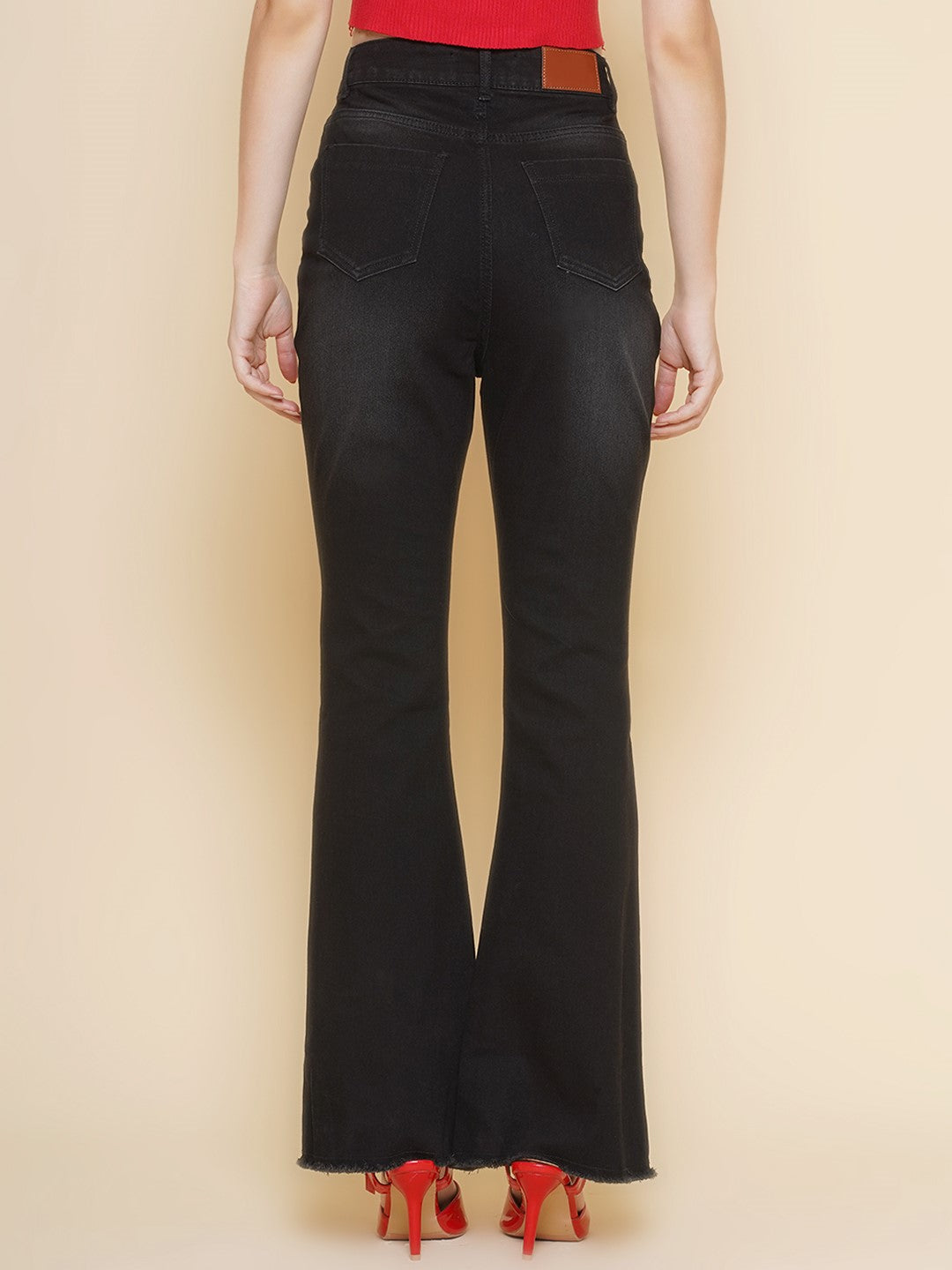 Raw hem Boot Cut Jeans in Black